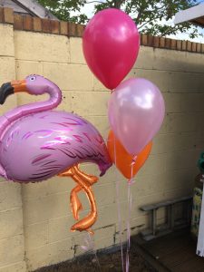 pinks and orange with flamingo balloon.