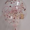 confeti balloon close up bella pink balloon clear filled with confetti