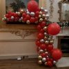 half balloon arch silver gold and red balloons