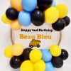 light blue, yellow, and black balloon hoop