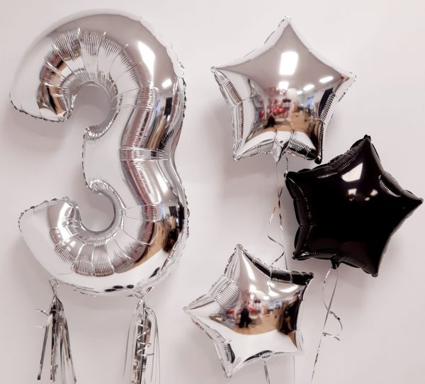 inflated silver balloon package close