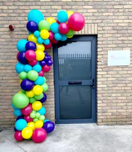 half balloon arch tropical