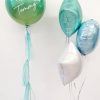 white, pastel blue and tiffany blue balloon bunch