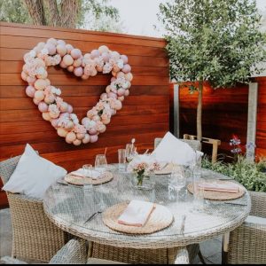 giant balloon display love heart with flowers